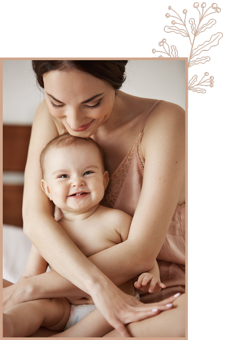 young-beautiful-happy-mom-sleepwear-her-newborn-baby-sitting-bed-smiling-playing-together-home